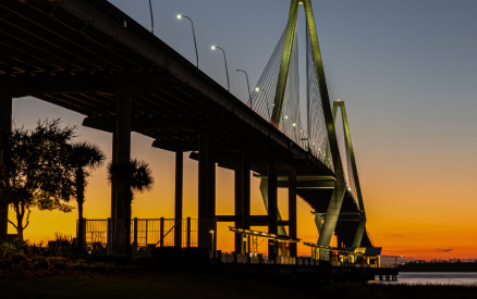 memorial waterfront park and bridge at sunset