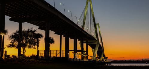 memorial waterfront park and bridge at sunset