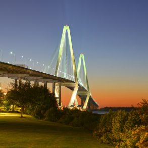 sunset over the ravenel bridge from the park