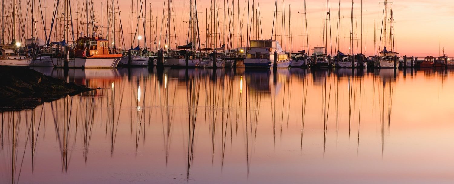 boats at sunset in a marina