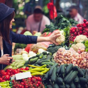 a lady at a farmers market