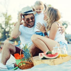 Family having a picnic on the beach.