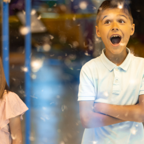 two children in awe at museum