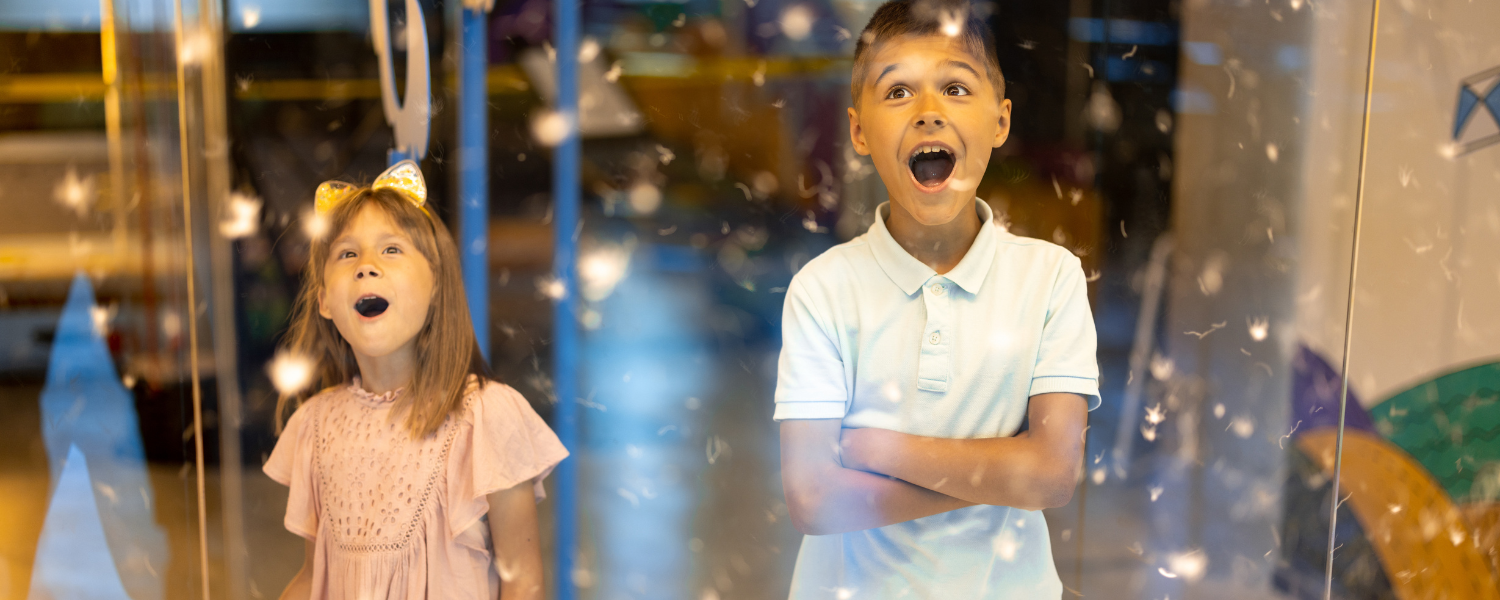 two children in awe at museum