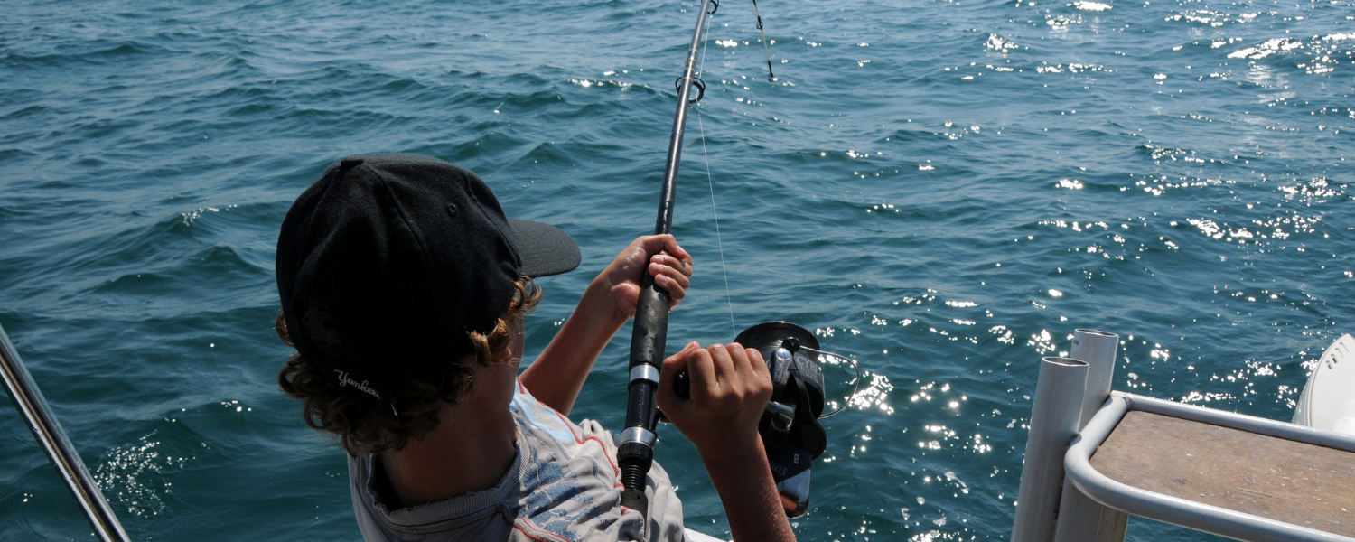 man in hat fishing