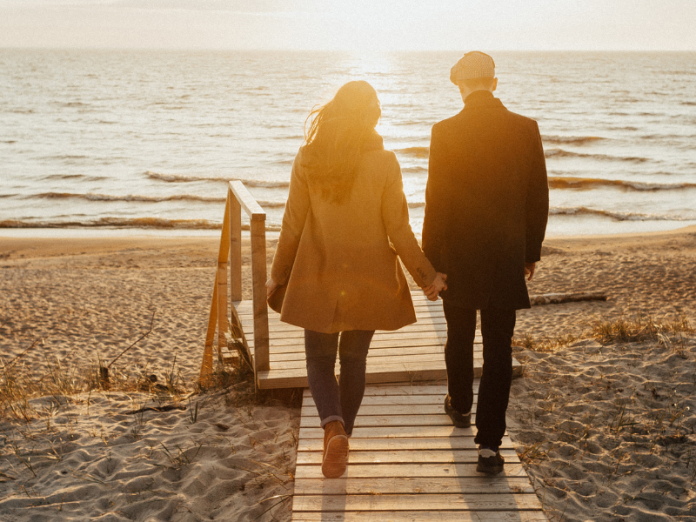 couple walking on beach